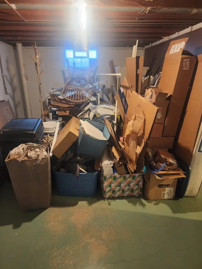 Roll-off dumpster container at job site for 6 Yard Dumpster Rental in Stacy